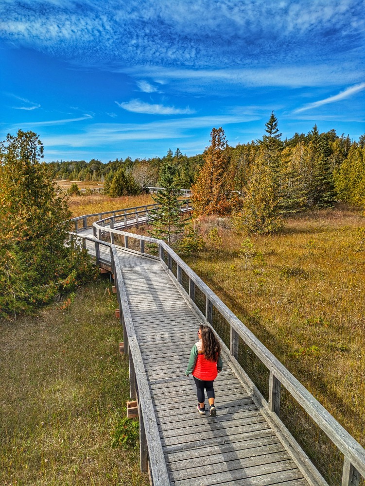 e walking on Singing Sands boardwalk in Bruce Peninsula National Park