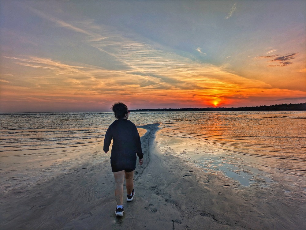 me walking on the beach at Singing Sands at sunset