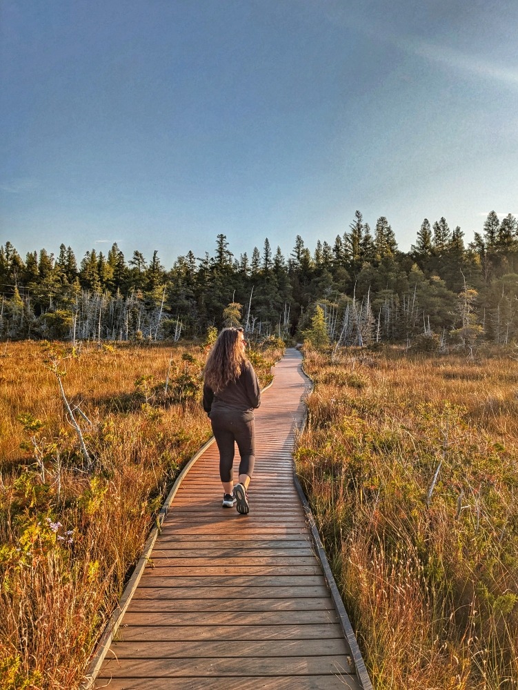 me hiking the boardwalk trail at Petrel Point Nature Reserve