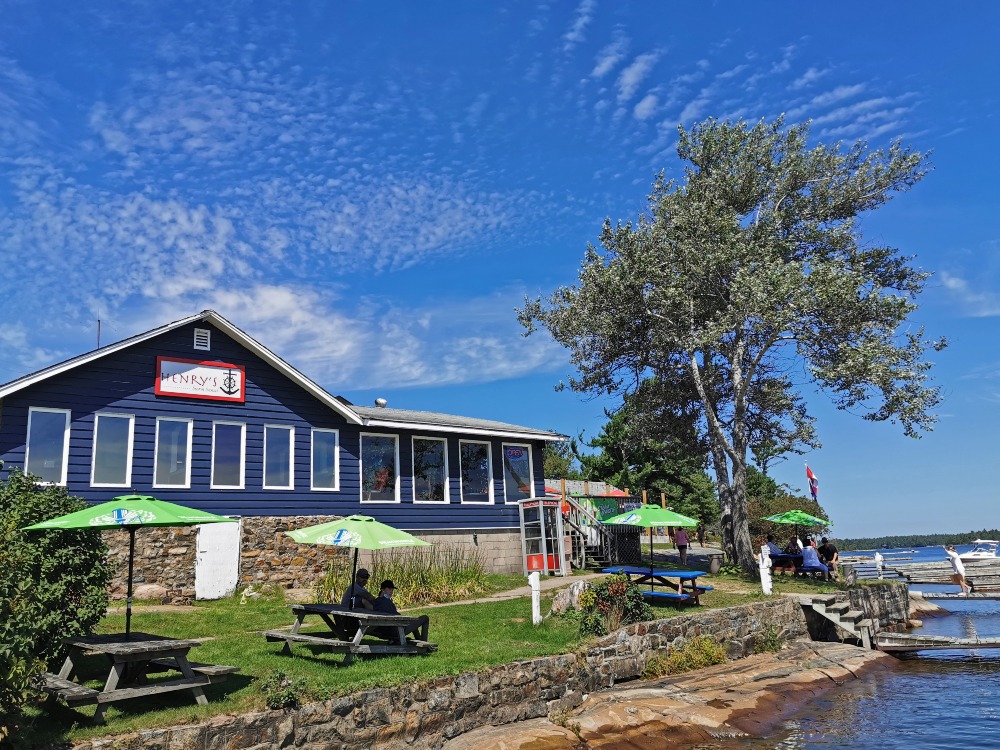 Henry’s Sans Souci Restaurant exterior as seen from a dock