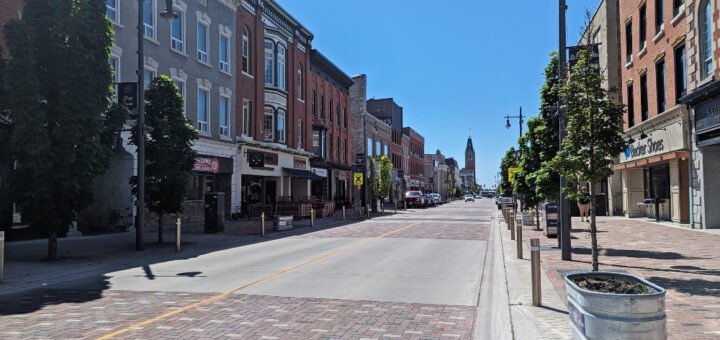 Empty street of downtown Belleville with historic buildings lining the street.