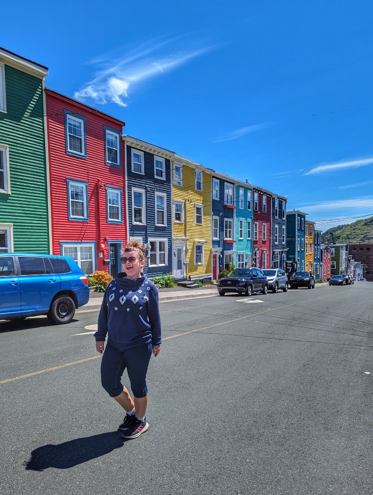 Me standing in front of Jellybean Row in St. John's Newfoundland