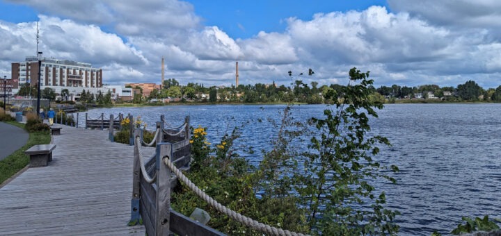 A boardwalk wrapping around the lakefront in Rouyan Noranda is one of the best places to visit in Abitibi-Témiscamingue