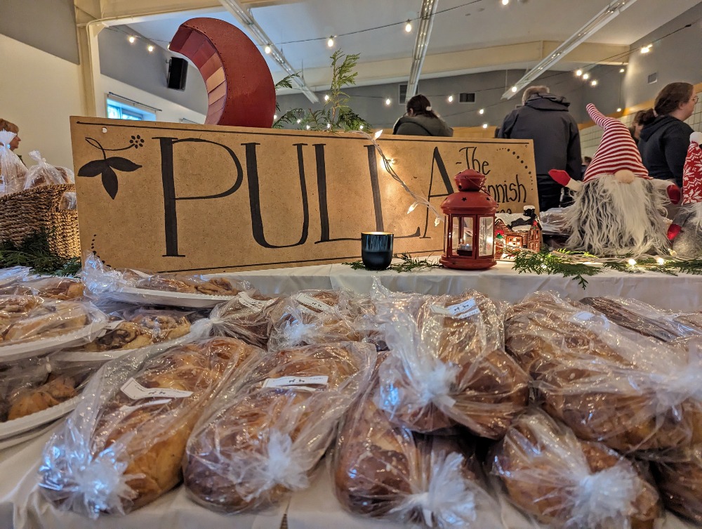 Table topped with Pulla bread and sign at the Cookstown Scandinavian Market
