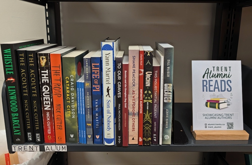 Trent Alumni books on shelf at Take Cover Books