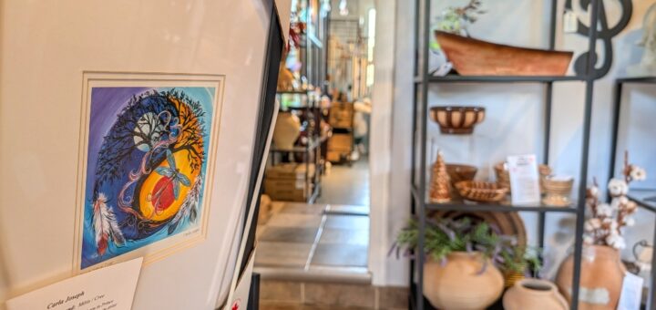 Close up of piece of art with other decor items in the background at Hamilton's of Pelham gift shop