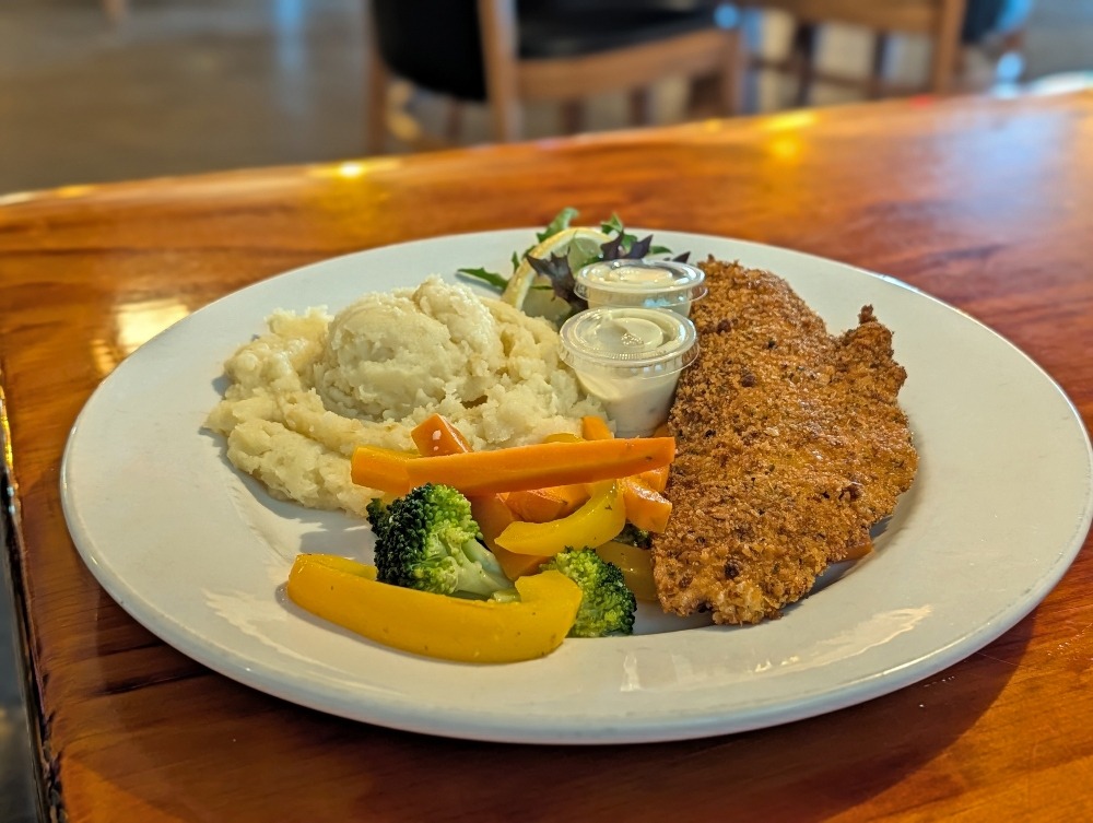 Lake Erie Pickerel dinner at Molly & OJ's restaurant with mashed potatoes and vegetables