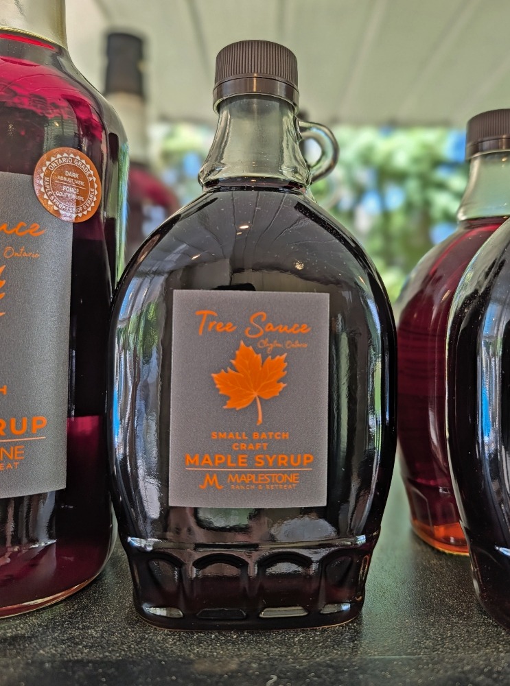 bottle of maple syrup from Maplestone Ranch & Retreat