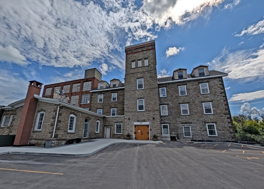 exterior of Tri Century Mill Suites