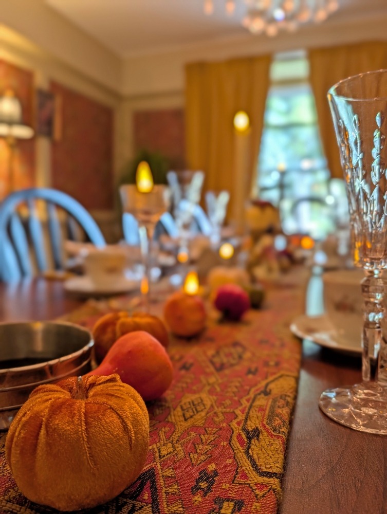 dining room table at the Old Mill Manor, close up of small pumpkin details along the runner