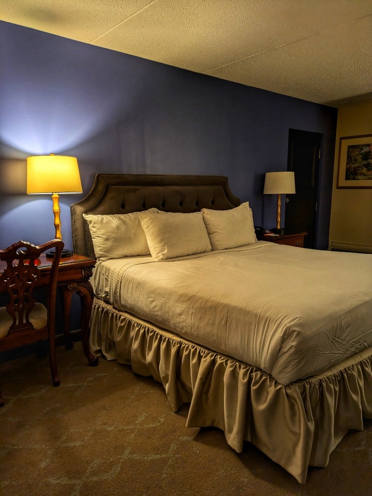 hotel room at Old Stone Inn with one bed