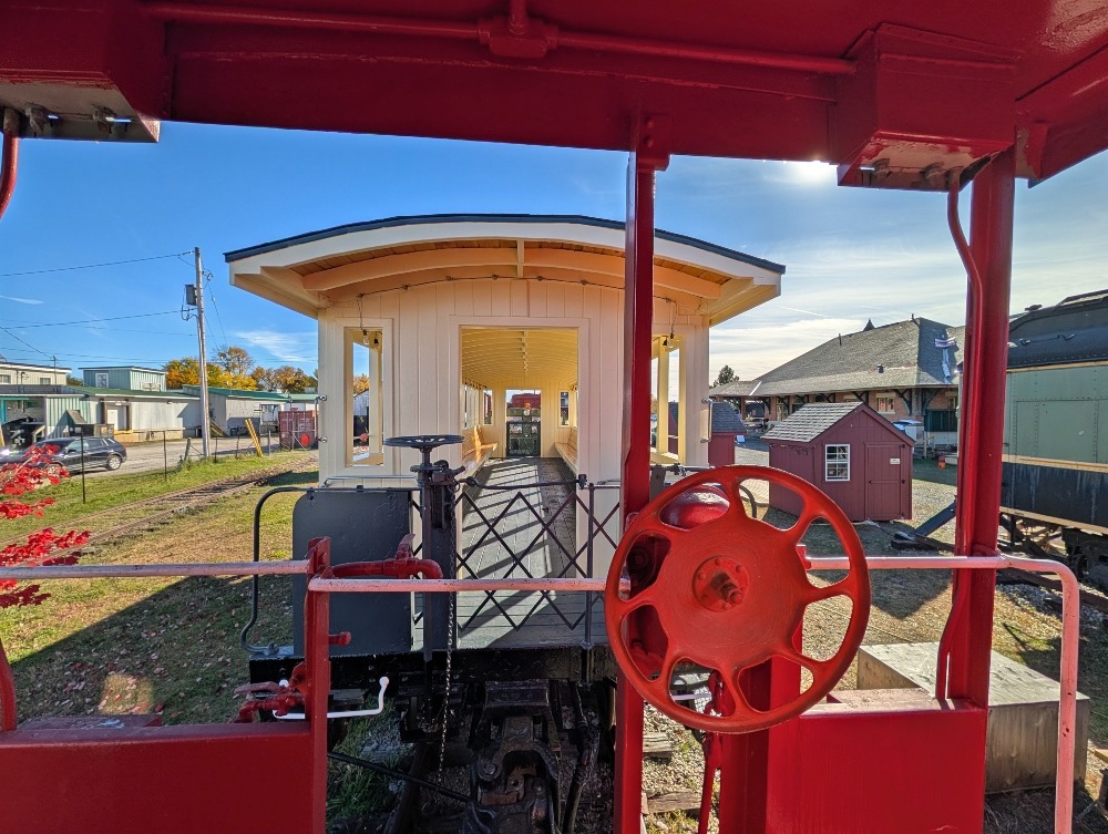 train ride at the Railway Museum of Eastern Ontario, looking out of one car and onto another